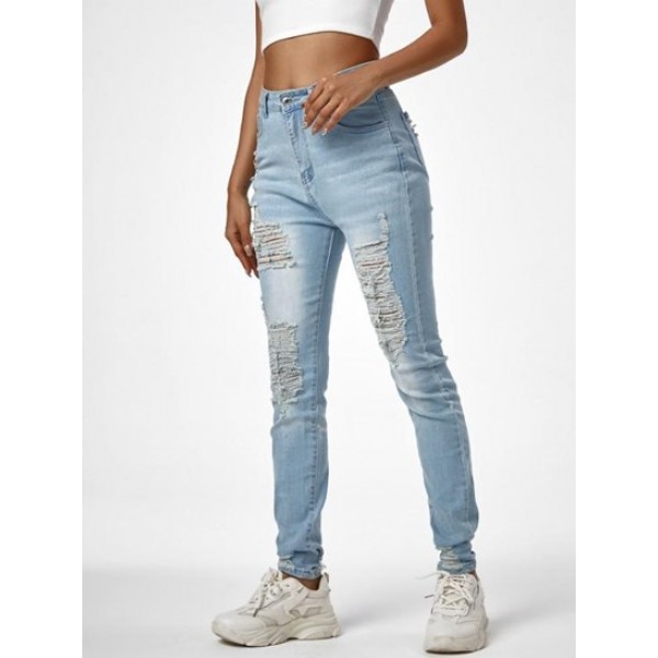 Shredded Distressed Light Wash Skinny Je...